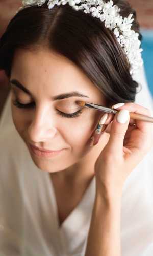 how many hair and makeup artists for wedding